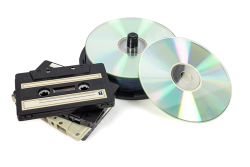 Preview: Stacks of CDs on spool and audio tapes