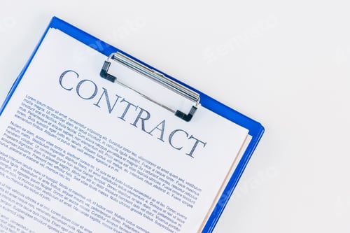 Preview: top view of clipboard with contract on white surface