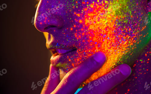 Preview: Fashion model with fluo painting on the face