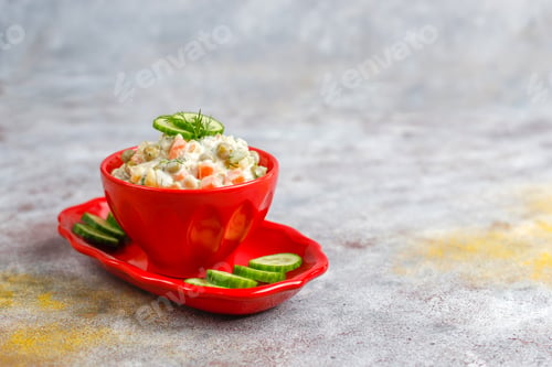 Preview: Bowl of traditional russian salad.