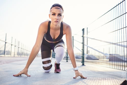 Preview: Fit woman ready to sprint