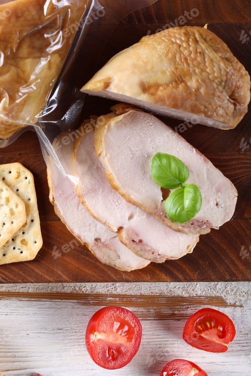 Preview: deli meats sausage on a wooden board for appetizer