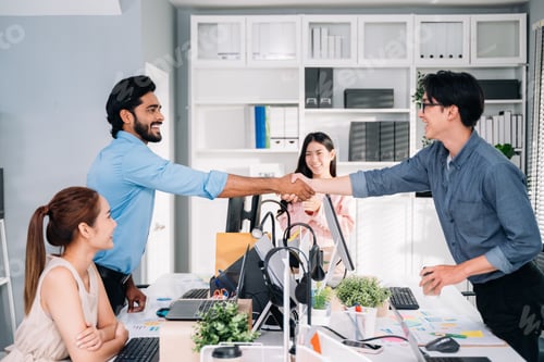 Preview: Group of business people working together at modern office