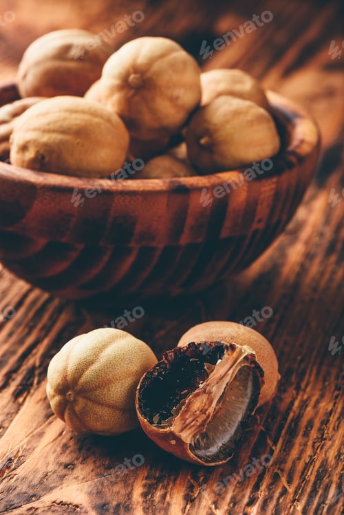 Preview: Dried limes on wooden table