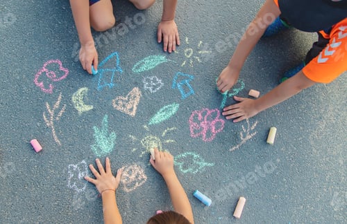Preview: Children's drawings on the asphalt with chalk. Selective focus.