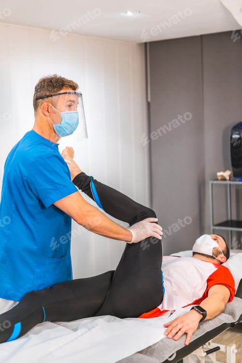 Preview: Physical Therapist Assisting Patient with Leg Stretch