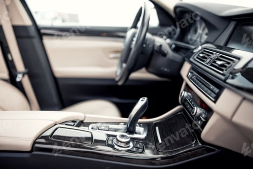 Preview: Modern beige and black interior of modern car, close-up of automatic transmission