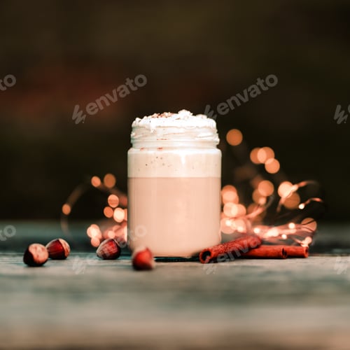 Preview: Nuts and cinnamon near jar of coffee