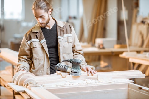 Preview: Carpenter checks out carving quality at the carpentry