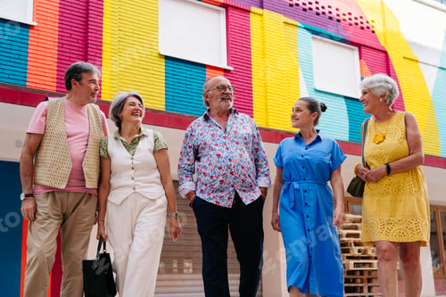 Preview: Group of senior friends meeting outddors in the city and having fun