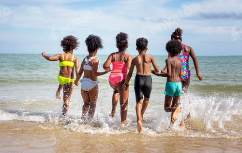 Preview: Kids running at the beach.