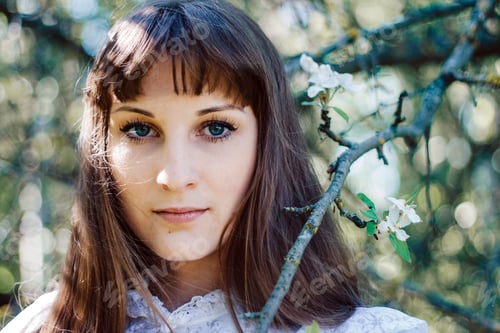 Preview: A bride in retro dress at spring time