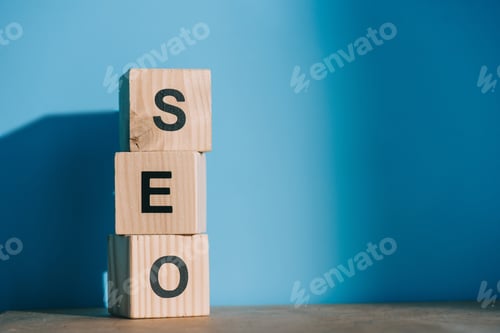 Preview: alphabet cubes with SEO word on blue background