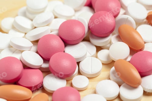 Preview: Assorted pharmaceutical medicine pills, tablets on wooden background