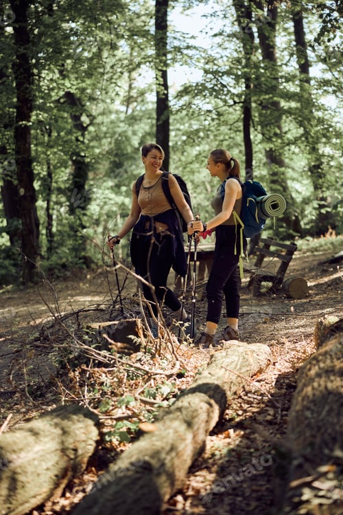 Preview: Mother And Daughter Hiking In The Forest