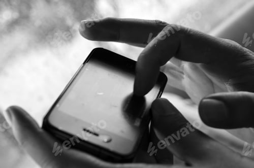 Preview: Woman scrolling on her mobile phone