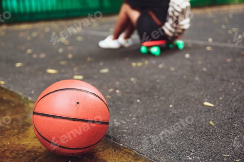 Preview: Young girl with plastic orange penny shortboard