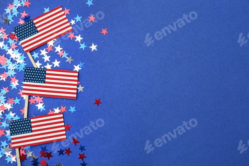 Preview: Flat lay composition with USA flags on color background, space for text. Happy Independence Day