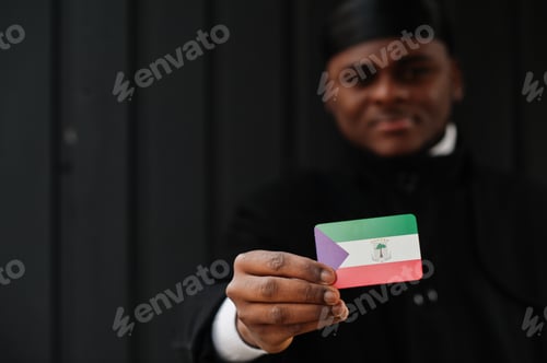 Preview: Young african man hold flag