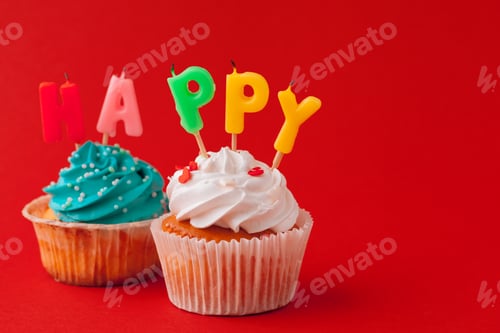 Preview: Happy birthday cupcakes on bright colored background