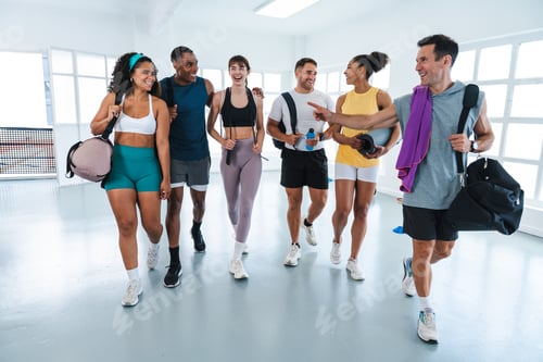 Preview: Group of fitness people leaving gym after workout session