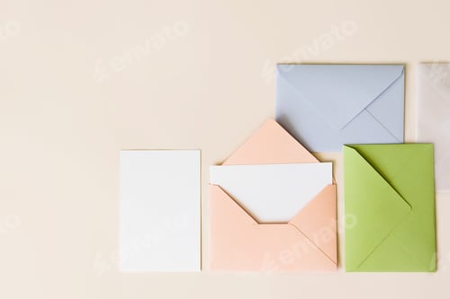 Preview: Mockup blank letter inside pink envelope, empty white paper and colorful closed envelopes