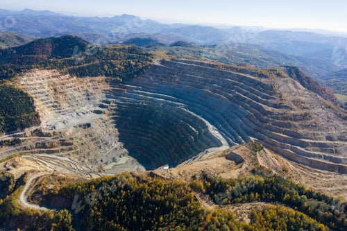 Preview: Flying above an open pit mine, copper excavation in Rosia Poieni, Romania. Aerial view