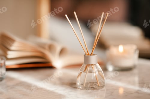 Preview: Home diffuser with aromatic liquid over book