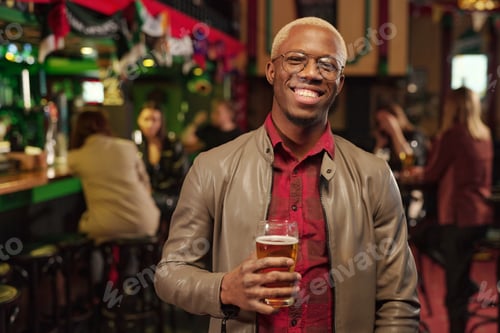 Preview: Young man with beer