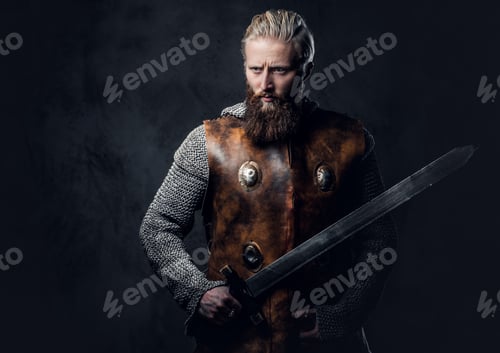 Preview: A man holds a sword.