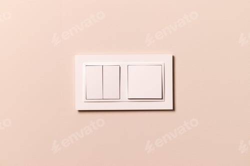 Preview: White electrical switches on beige wall