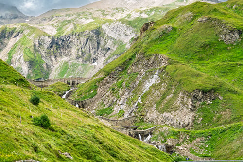 Preview: Grossglockner, Austria Alpine Waterfalls Carving Through Lush Green Mountain Slopes