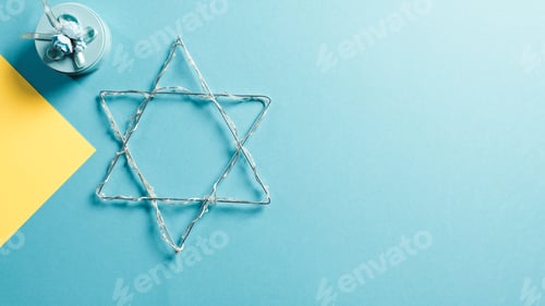 Preview: Hanukkah David star and blue copy space
