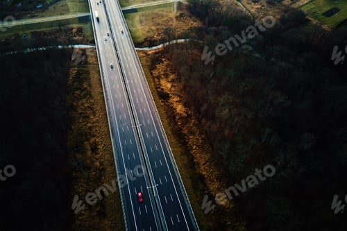 Preview: Aerial view of highway with moving cars