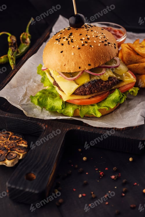 Preview: Fresh tasty burger on wooden board