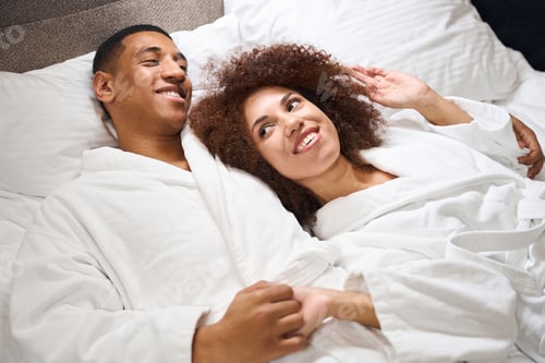 Preview: Affectionate Couple Relaxing Together in Bed