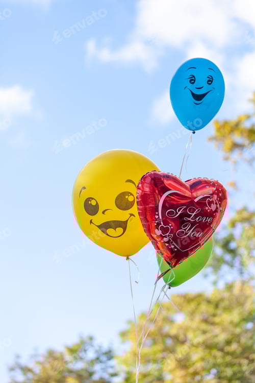 Preview: Helium balloons different colors and different shapes in the sky