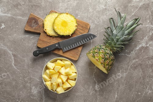 Preview: Flat lay composition with fresh sliced pineapple on wooden background