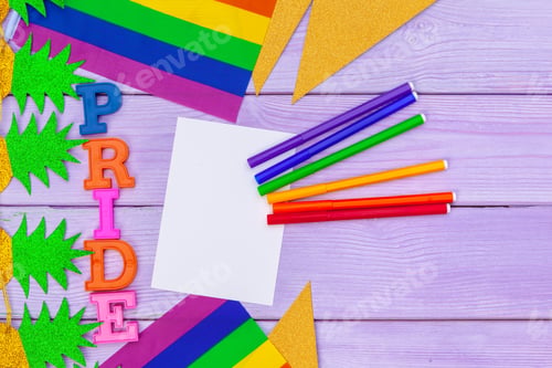 Preview: Gay pride flag on wooden table