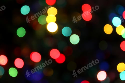 Preview: Colorful festive blurry lights of Christmas decorations