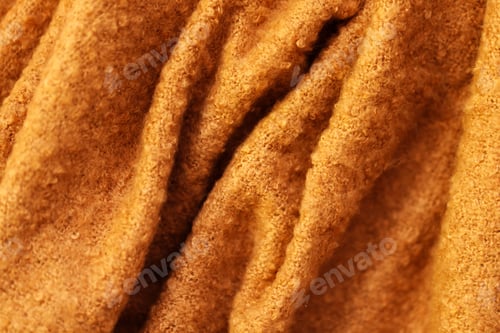 Preview: Knitting Wool Texture. Background texture of pattern knitted fabric made of cotton or wool closeup