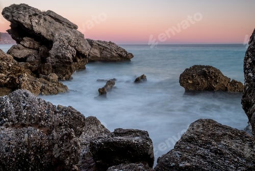 Preview: Beautiful shot of sunset over a lake in the mountains