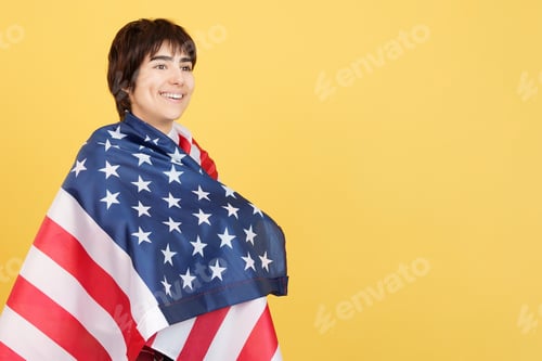 Preview: Androgynous person wrapped with a USA flag