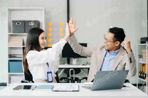Preview: Two confident business man shaking hands during a meeting in the office, success, dealing