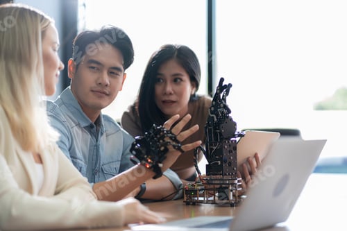 Preview: Young students researching inventions with modern technology