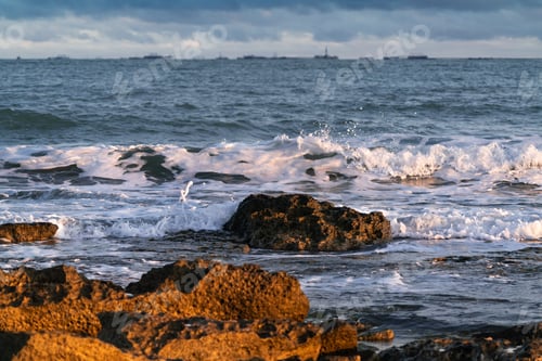 Preview: Rocky coastline and crashing waves