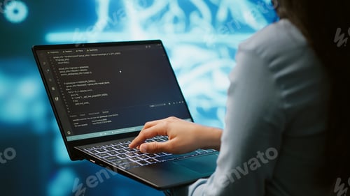 Preview: Close up shot of IT expert using AI system and laptop