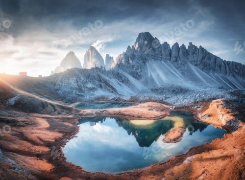 Preview: Aerial view of beautiful rocks, mountain lake at sunset