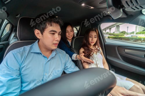 Preview: Asian Saleswoman adviced the car function to couple customer for checking the car