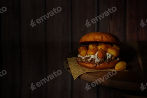 Preview: Closeup shot of a hamburger on the wooden background